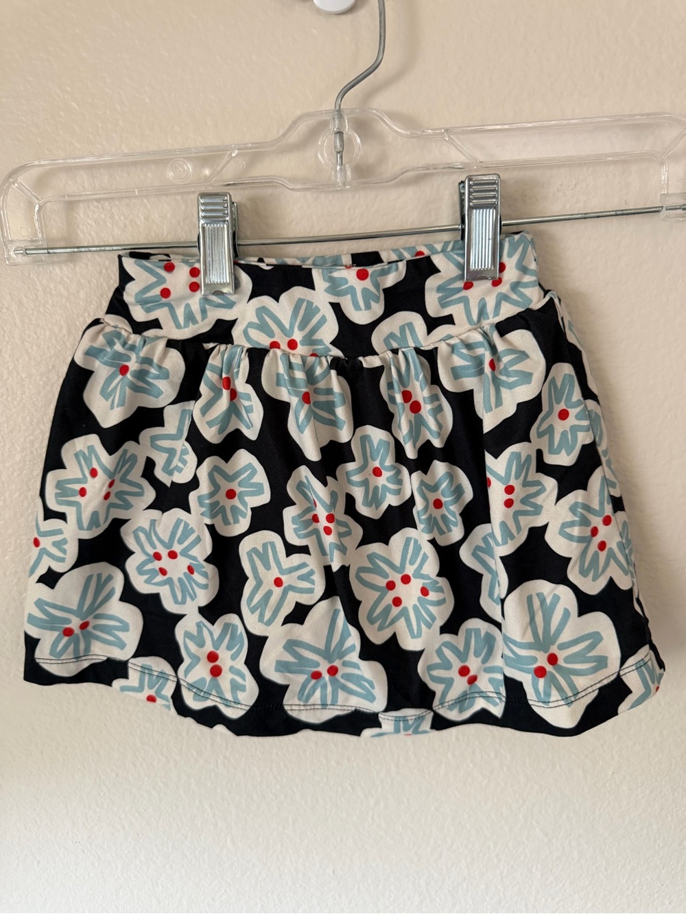 Hanna Andersson Black Skort with Cream Flowers and Blue Accents